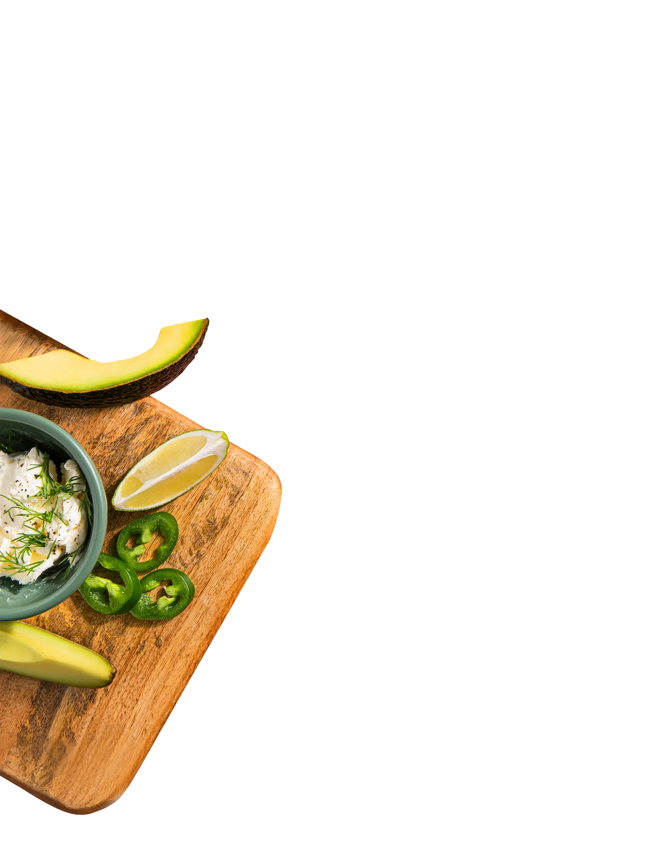 avocados and dip on a cutting board