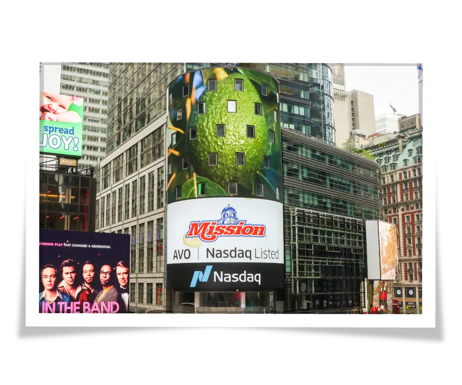 Photo of the Nasdaq building in New York with a Mission avocados advertisement