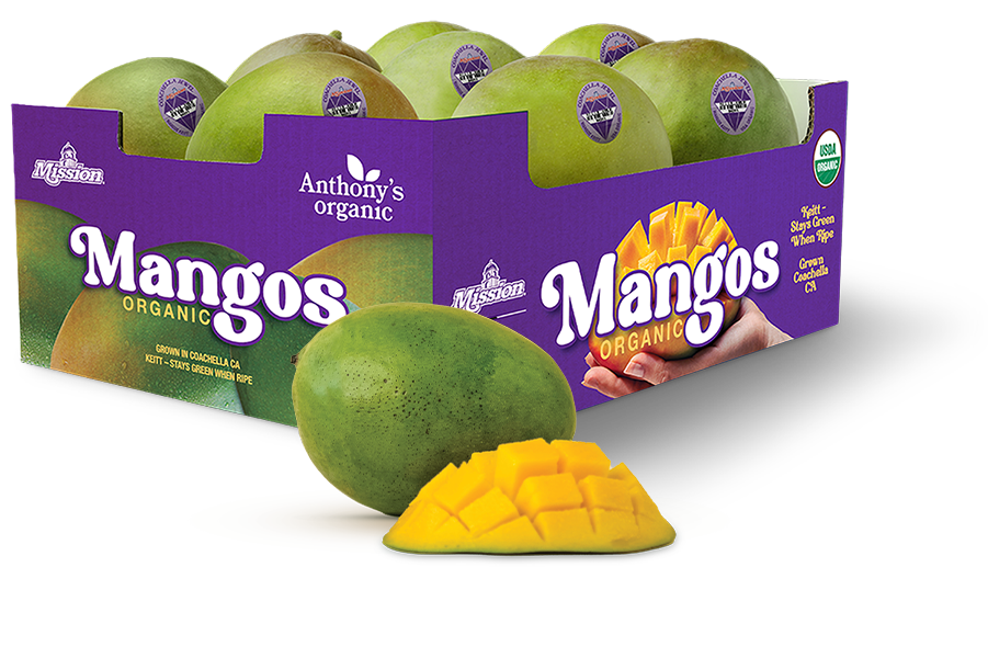 a whole mango and cut mango with a case of mangos